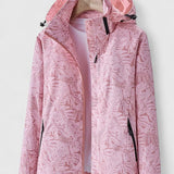 Tjaša – Elegantna vetrovka z botaničnim vzorcem