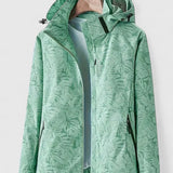 Tjaša – Elegantna vetrovka z botaničnim vzorcem