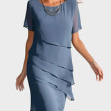 Kristina – Elegantna obleka za oblikovanje postave