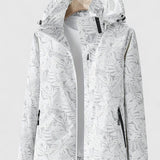 Tjaša – Elegantna vetrovka z botaničnim vzorcem