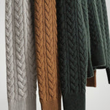 Britta | Eleganten pulover za dame z rafiniranimi gumbi