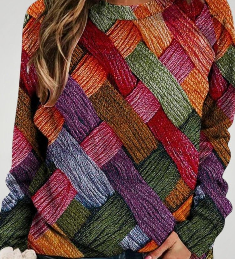 Henrietta | Barvit pulover s stilom in udobjem