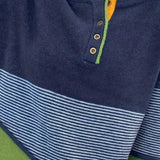 Nadja | Črtast pulover z elegantnimi detajli