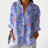 Nika – Poletna bluzica z živahnim potiskom